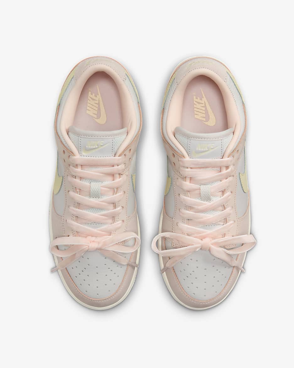 Soft pink nikes on sale